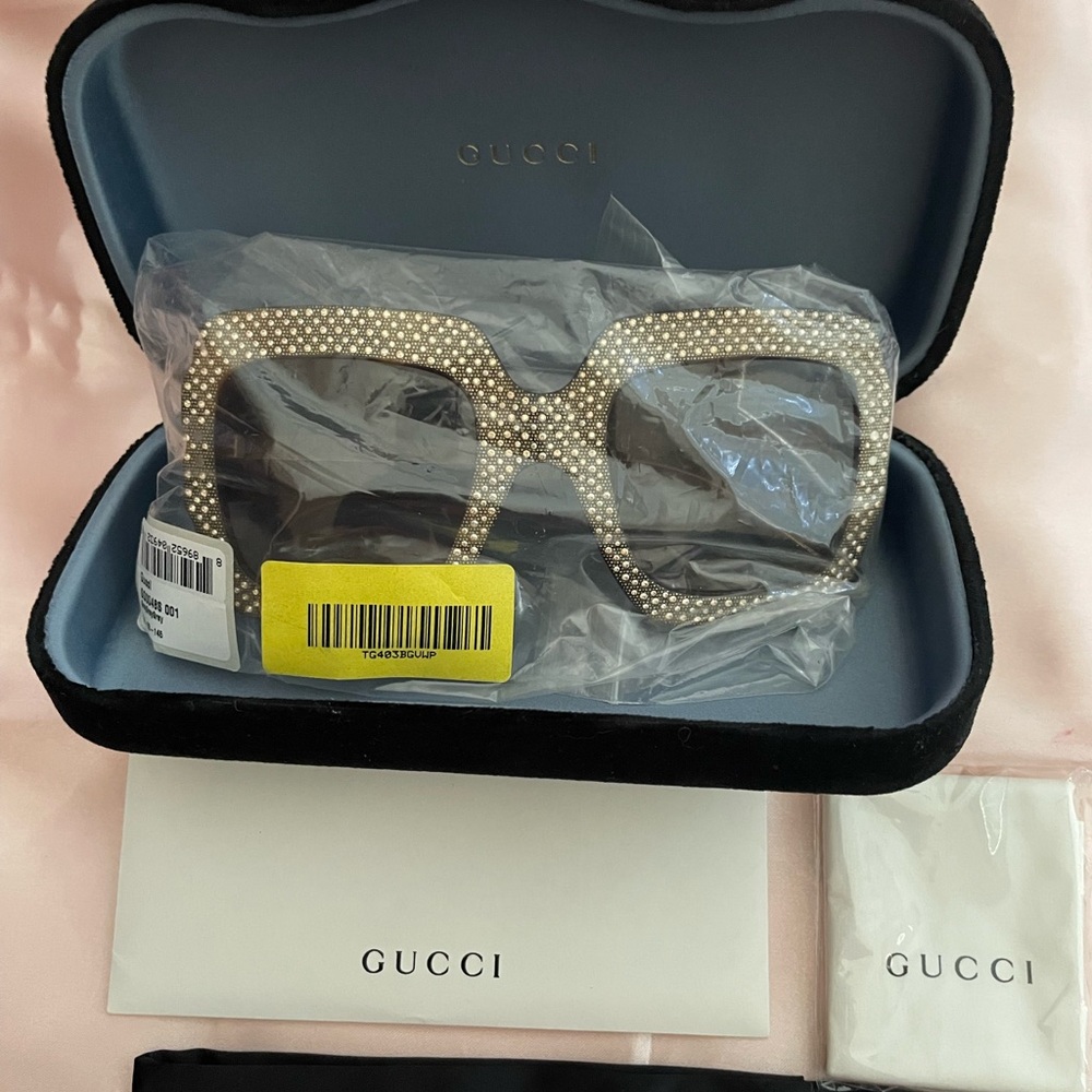 Brand New Gucci Sunglasses. Never been worn.